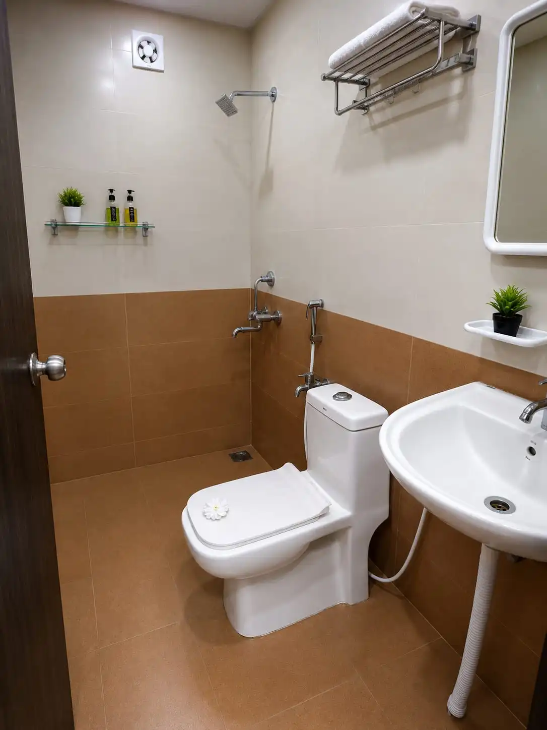 Clean attached bathroom at Ganesh Sadan Srisailam